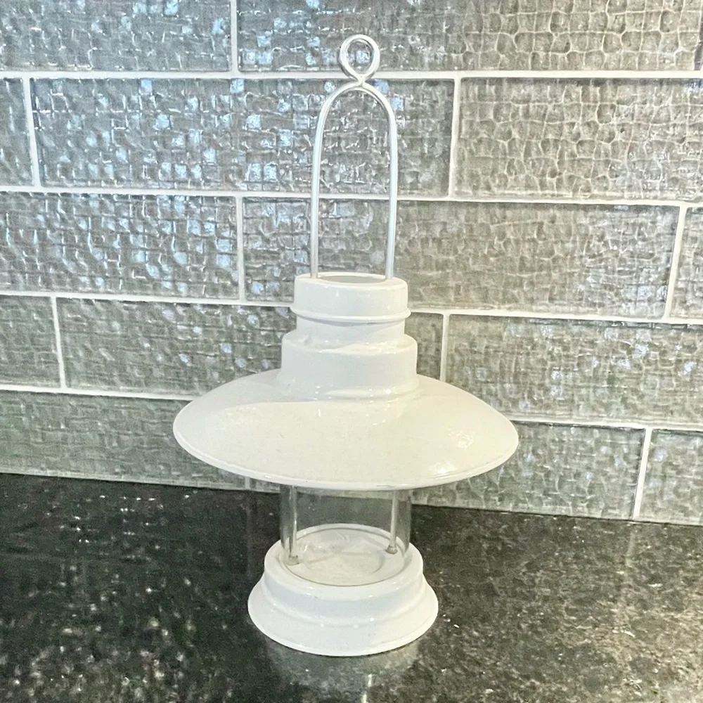 White metal lantern with glass
